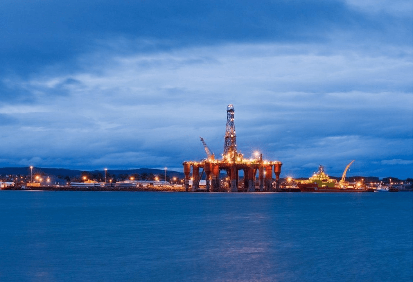 Oil terminal and tanker at dusk